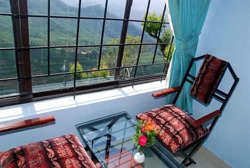 Hollyhock munnar homestay balcony view